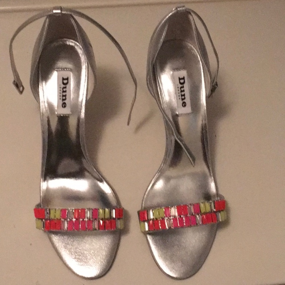 Size 10 silver ankle strap sandal.